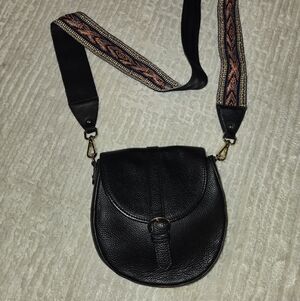 Black Crossbody Saddle Bag with Patterned Strap